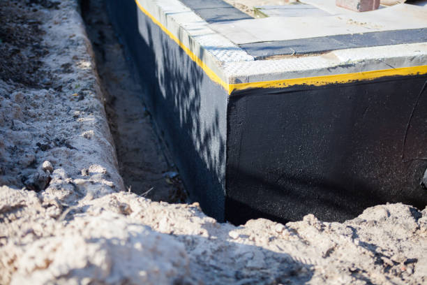 Professional Exterior Waterproofing technician working in Little Falls, MN